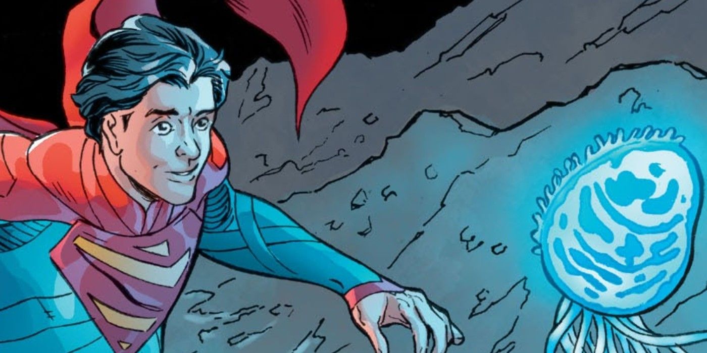 Jon Kent next to a blue glowing rock in Superman Infinite Frontier DC Comics