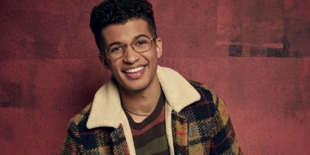 Jordan Fisher as Mark Cohen in a promotional still for Rent: Live