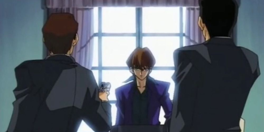 Kaiba with a gun pointed at him in Yu-Gi-Oh!