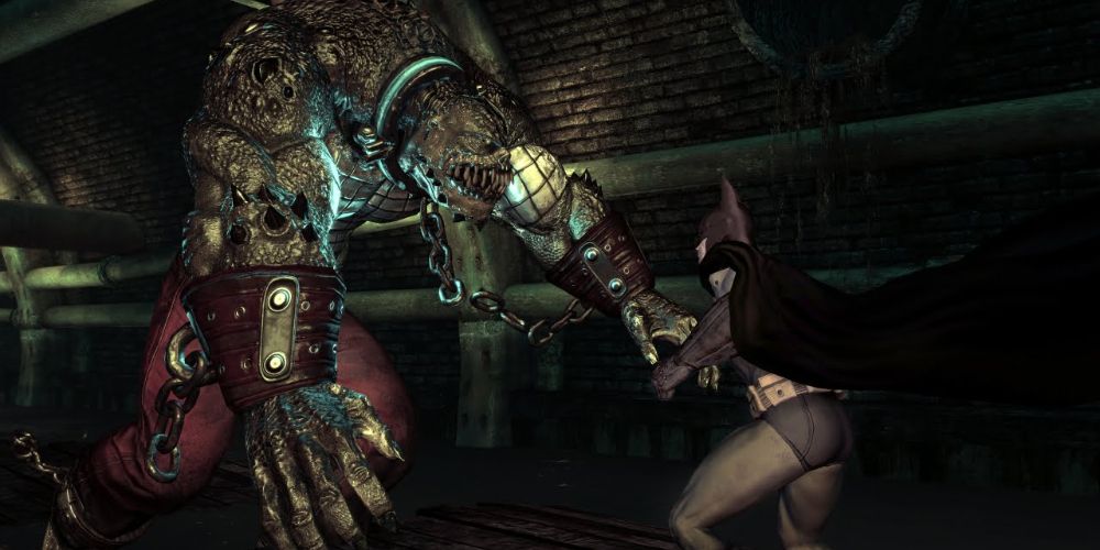 Killer Croc fighting Batman in the sewers in Arkham Asylum