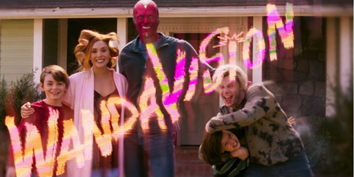 Wanda, Vision, the twins and Pietro standing outside their home, smiling