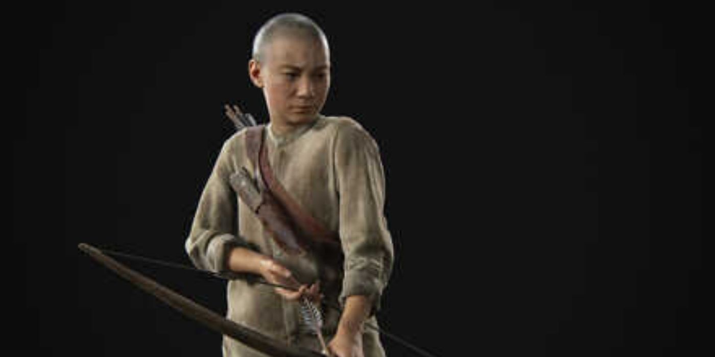 Lev holding a bow and arrow.