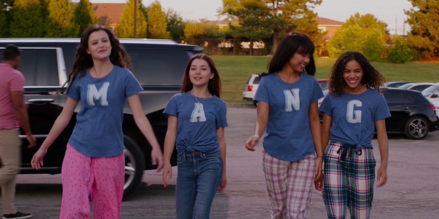 MANG wearing their shirts outside of the high school walking into the sleepover on Ginny and Georgia