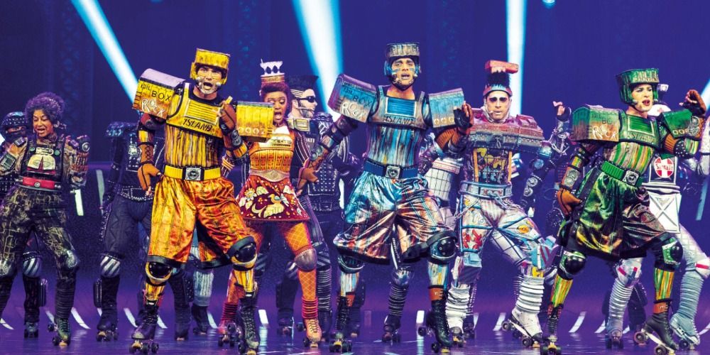 Main cast of Starlight Express dancing together on stage