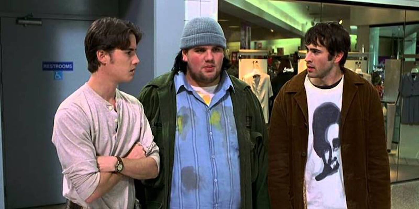 Jeremy London, Jason Lee, and Ethan Suplee stand together in Mallrats.