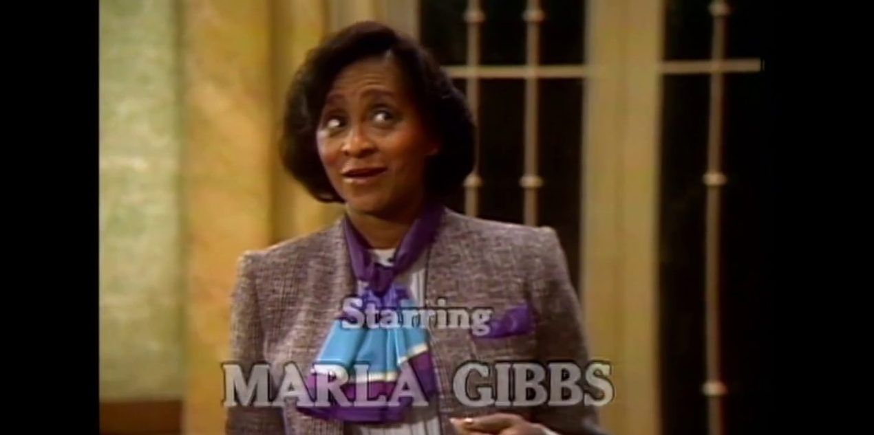 Marla Gibbs in Checking In as Florence Johnston, executive housekeeper