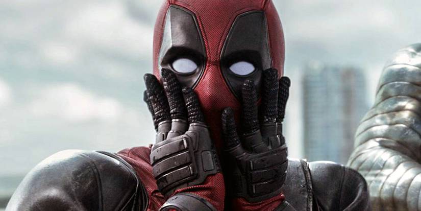 Ryan Reynolds as ᴅᴇᴀᴅpool looking shocked with his hands in his mouth in ᴅᴇᴀᴅpool (2016)