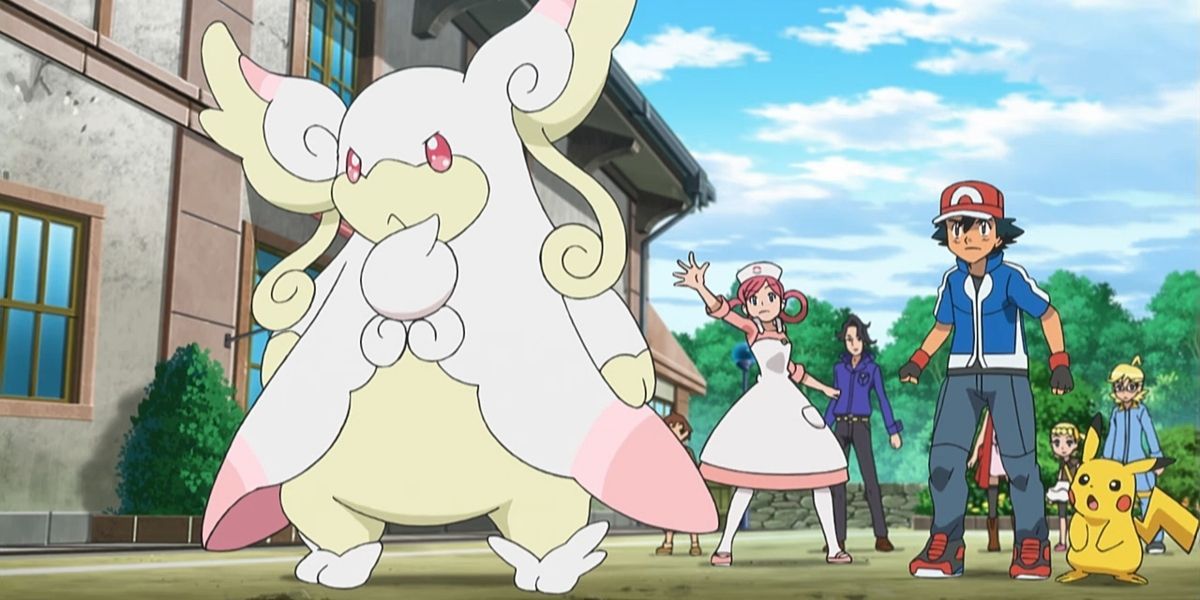 Mega Audino stands in the foreground with Ash, Pikachu and their friends behind it in the Pokémon anime