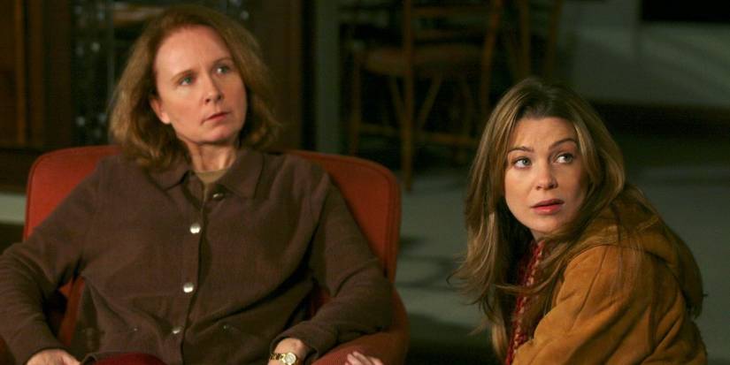 Meredith Grey stares at a visitor in Grey's Anatomy. She is also seen to be sitting next to Ellis Grey, who is sitting in a red armchair