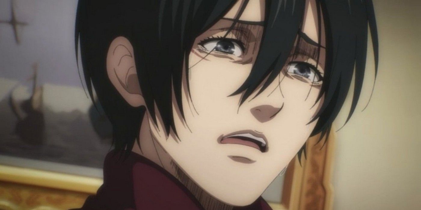 A close up of Mikasa looking distressed
