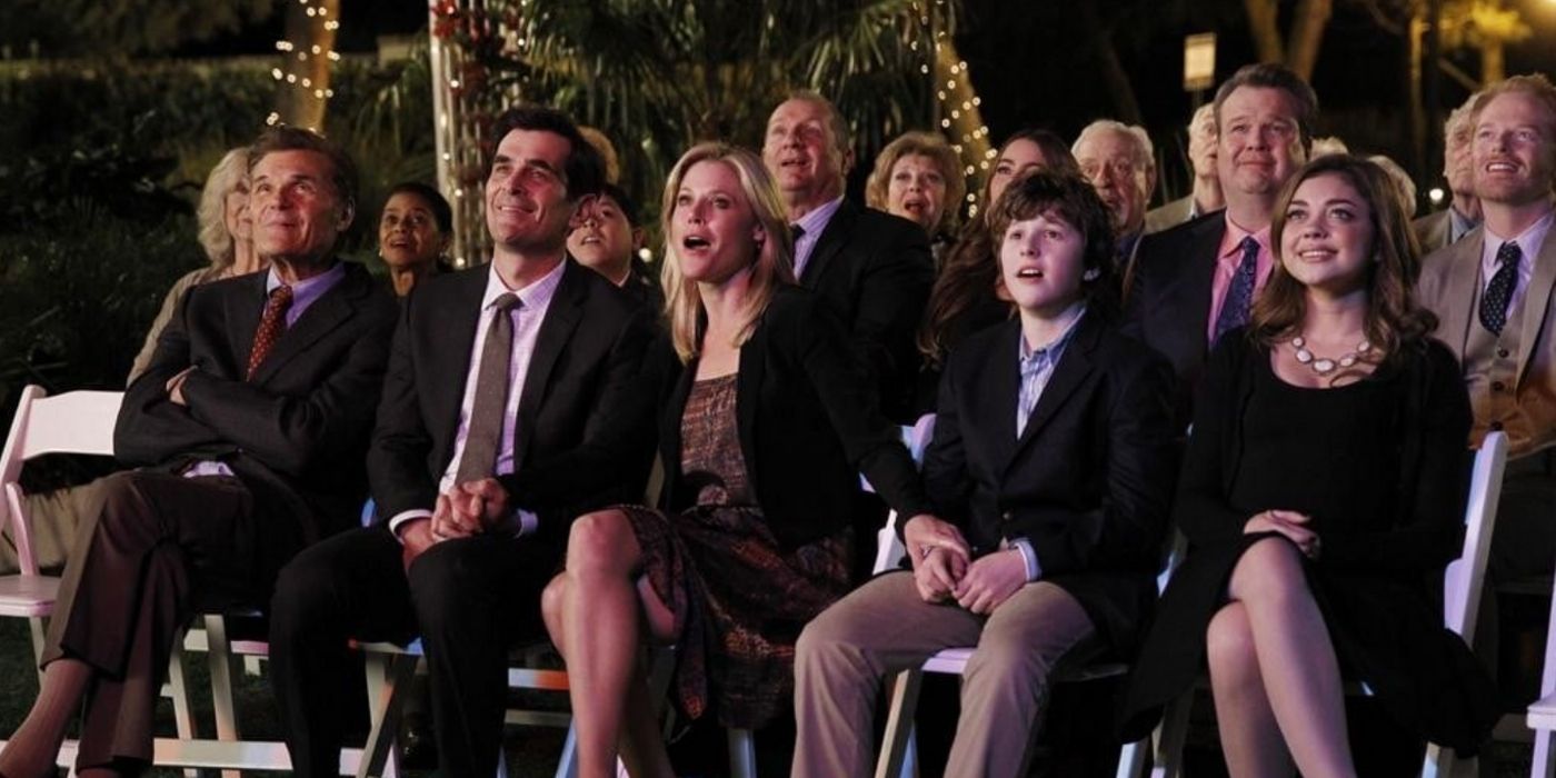Phil and his family members at his mother's funeral in Florida in Modern Family