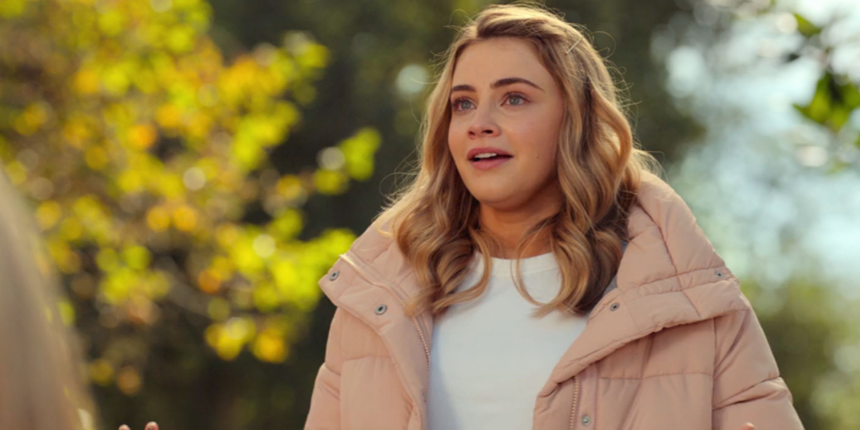 Josephine Langford as Emma Cunningham looking at something in Moxie on Netflix