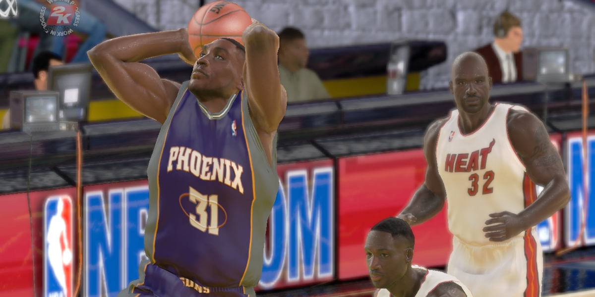 Shawn Marion, wearing a Phoenix jersey, dunks in NBA 2K6