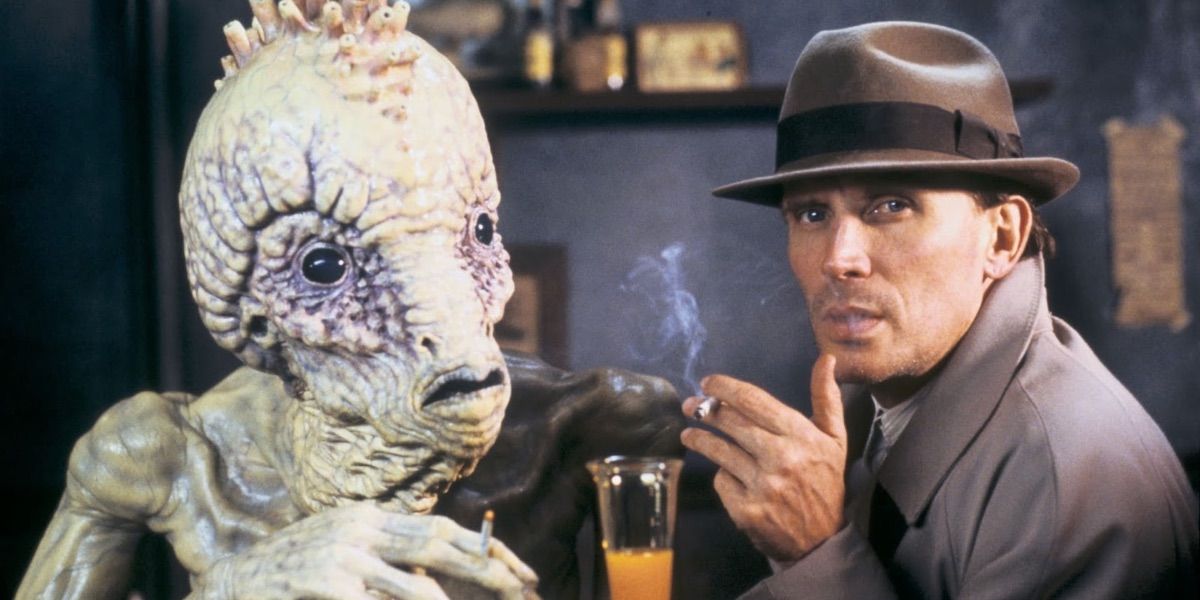 Peter Weller with a monster in Naked Lunch