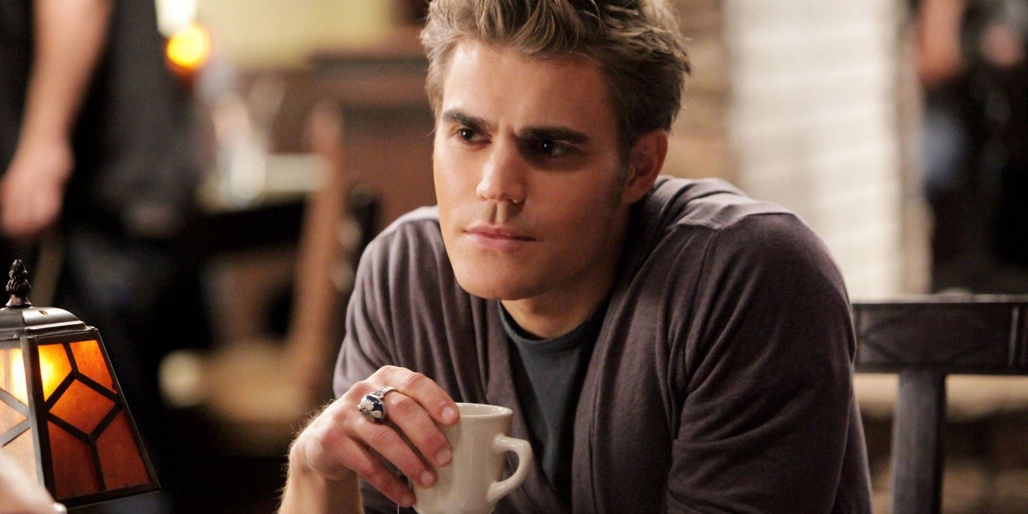 Stefan Salvatore holding a coffee cup in The Vampire Diaries_Stefan Salvatore