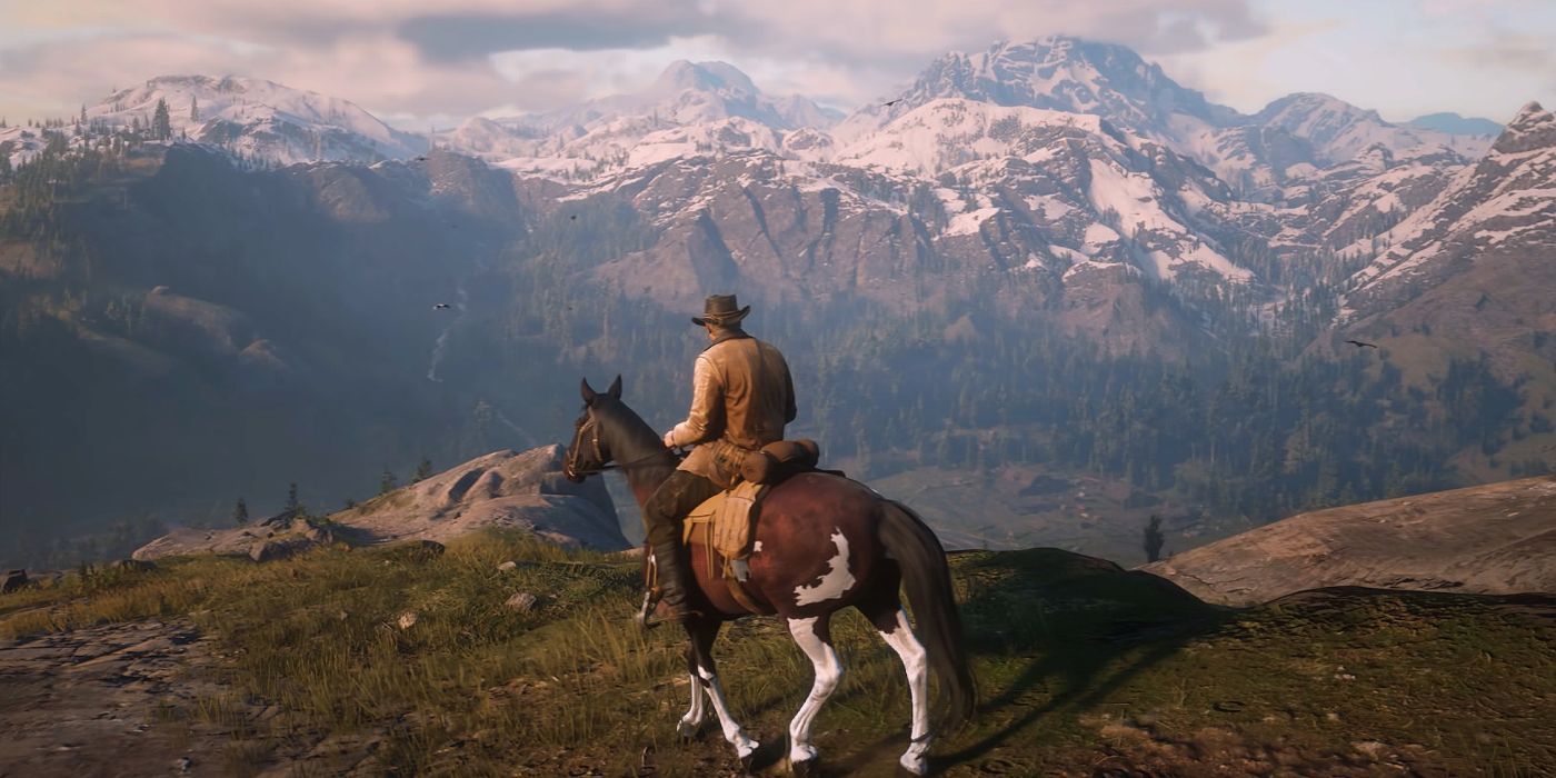 Scene from RD2 with Arthur on horse overlooking mountain scene