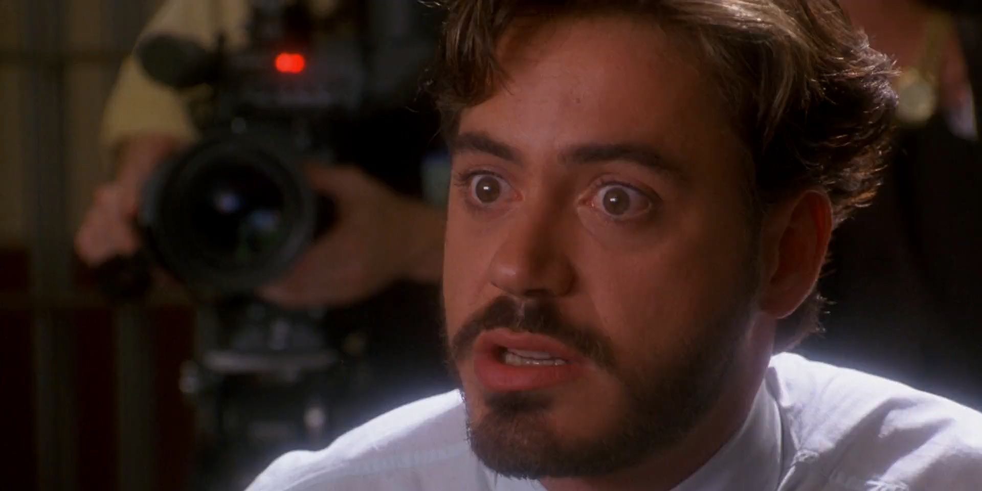 Robert Downey Jr in Natural Born Killers with an intense look on his face