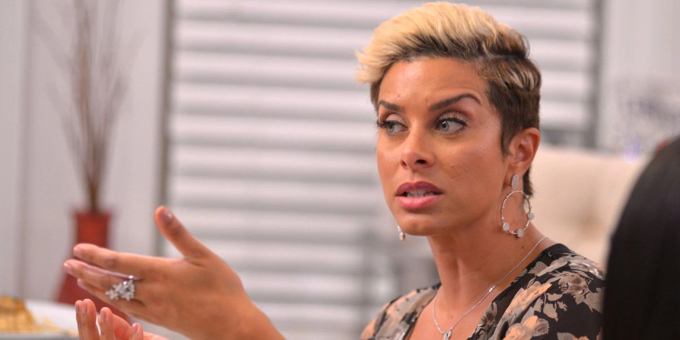 Robyn Dixon looks annoyed and gestures with her left hand in Real Housewives of Potomac.