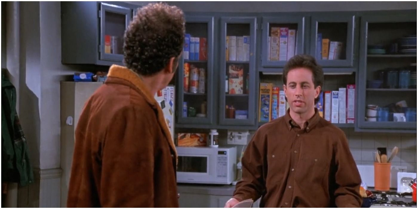 Kramer and Jerry talking in his kitchen in his apartment on Seinfeld