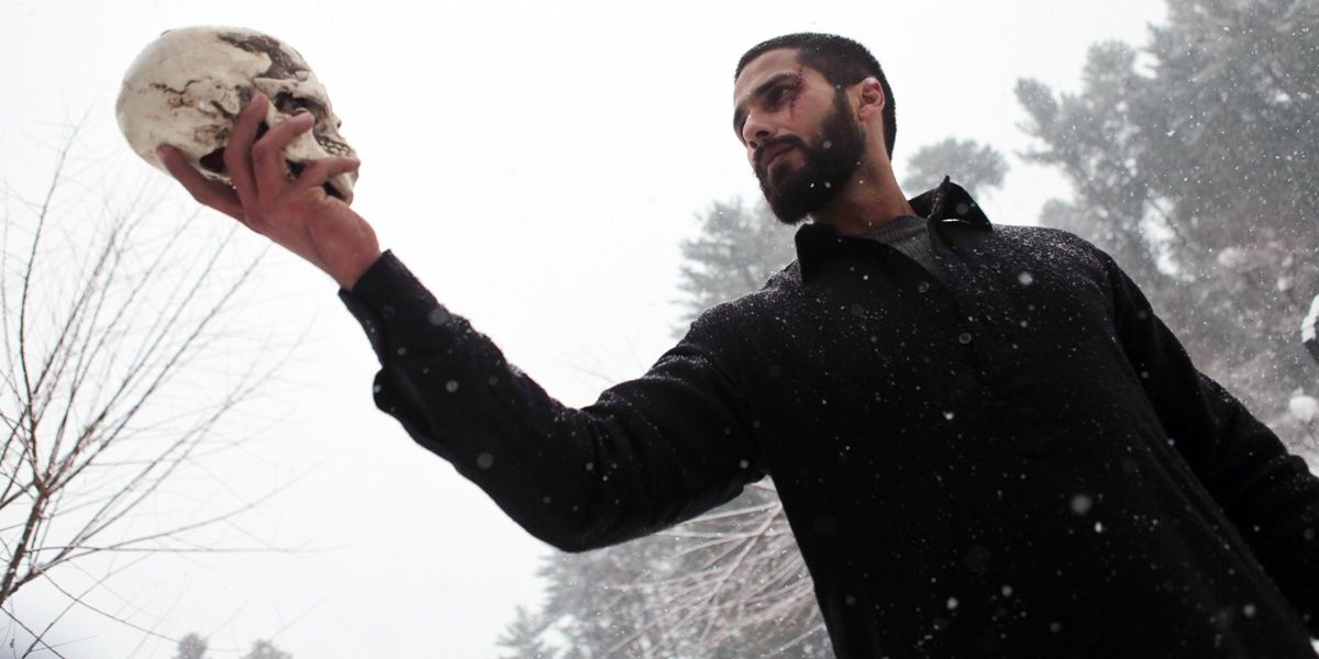 Shahid Kapoor holding a skull enacting the famous Hamlet scene in a still from Haider Cropped