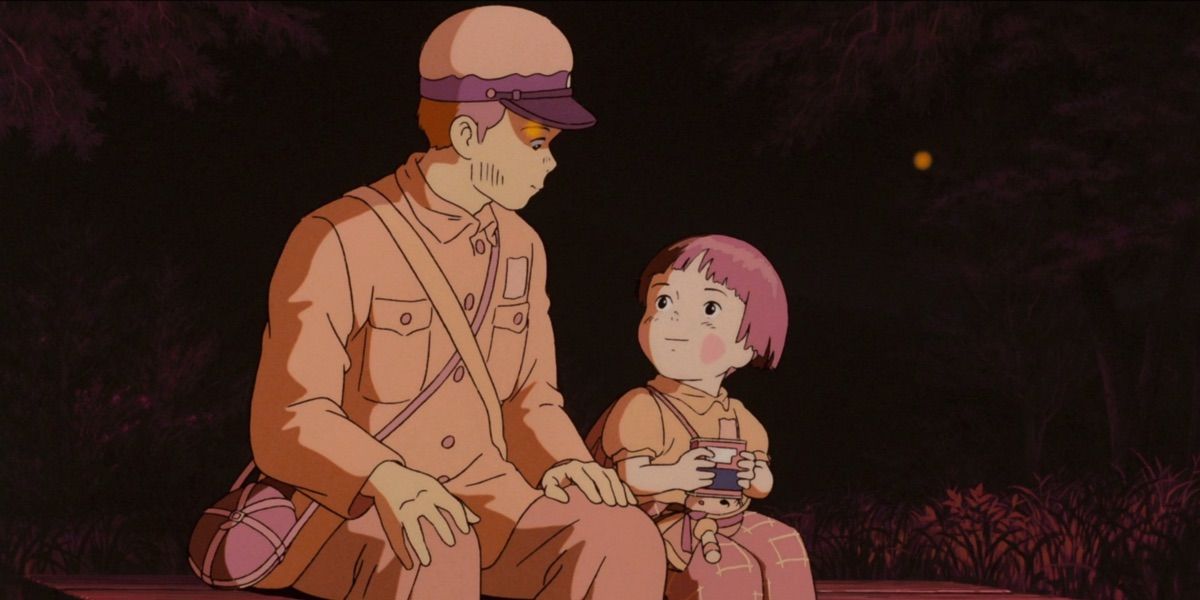 Seita dan Setsuko duduk berdampingan di Grave of the Fireflies