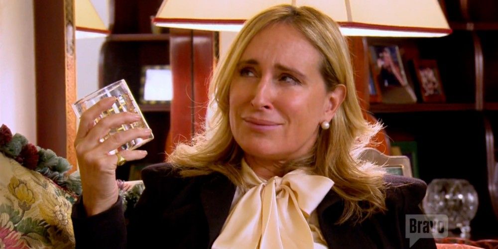 Sonja Morgan holding an empty glass on an episode of RHONY