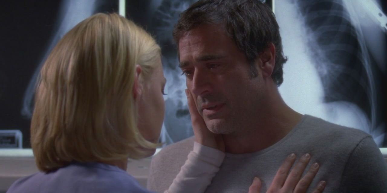 Denny and Izzie having an emotional moment in his last episode.