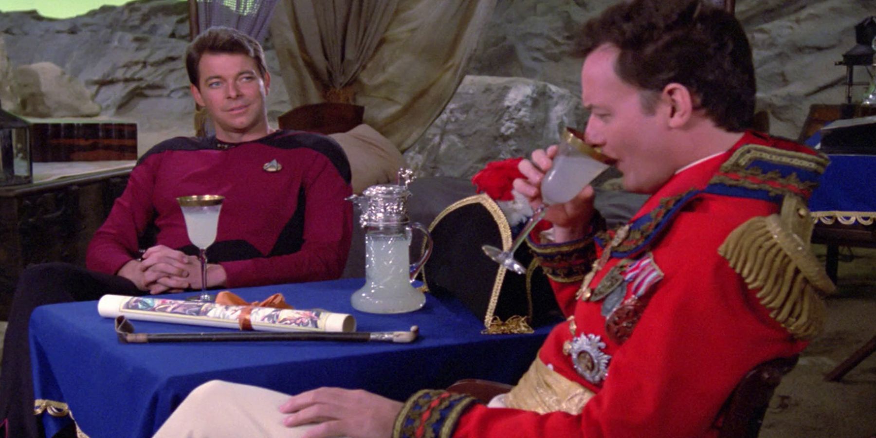 Riker and Q Share a Drink as Marshal Q Gives Riker His Power. 