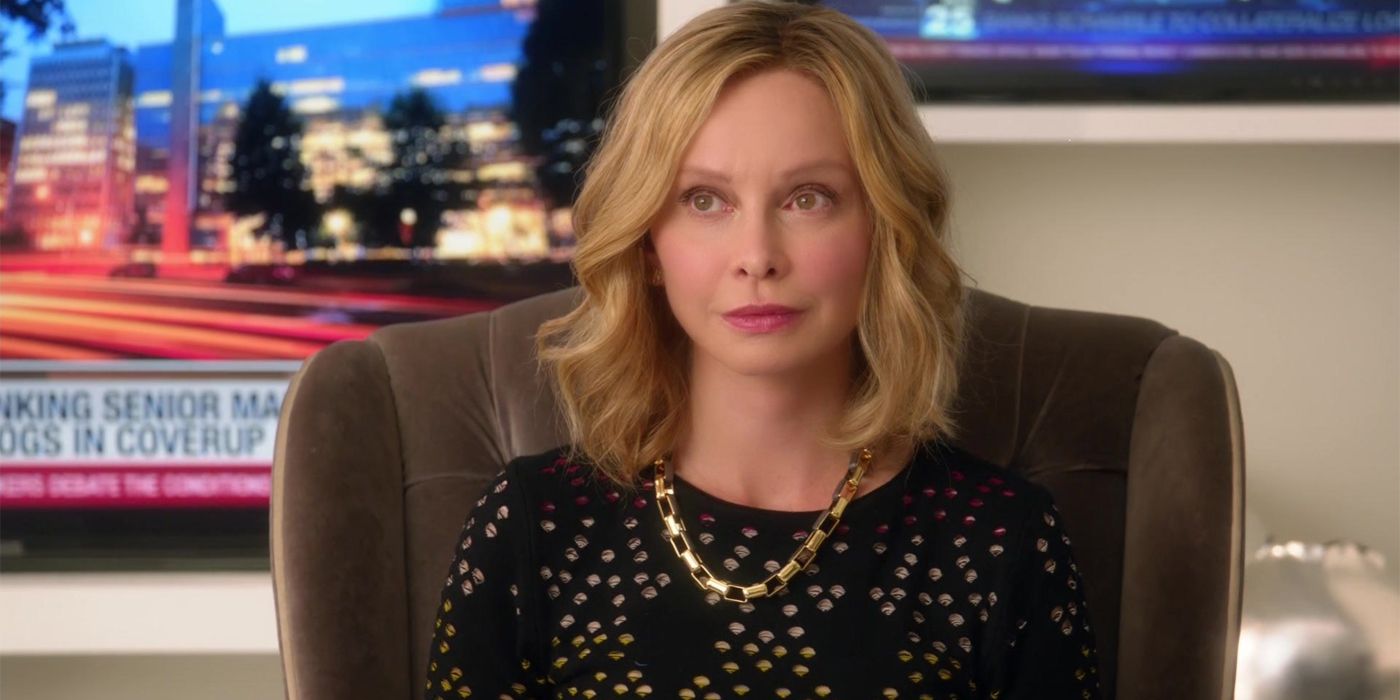 Cat Grant with a smile on her face at her office in CatCo