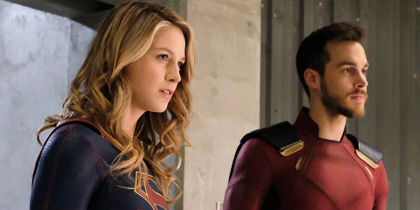 Supergirl and Mon-El in their costumes