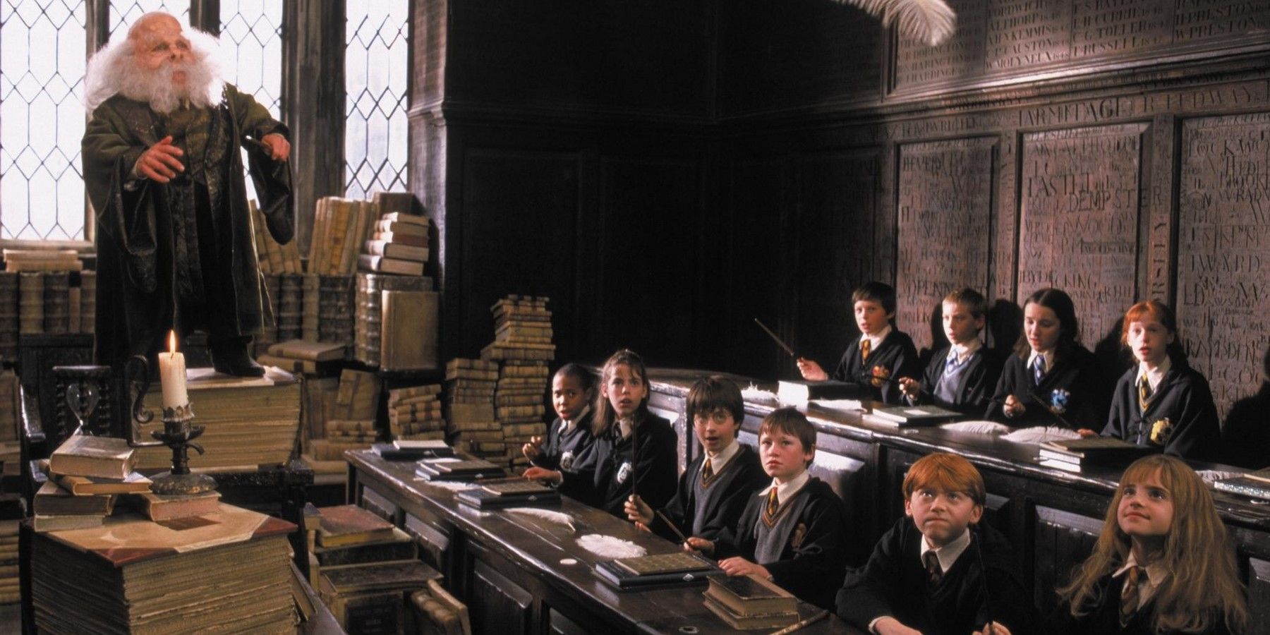 Professor Flitwick standing before his class in the original Harry Potter movie.