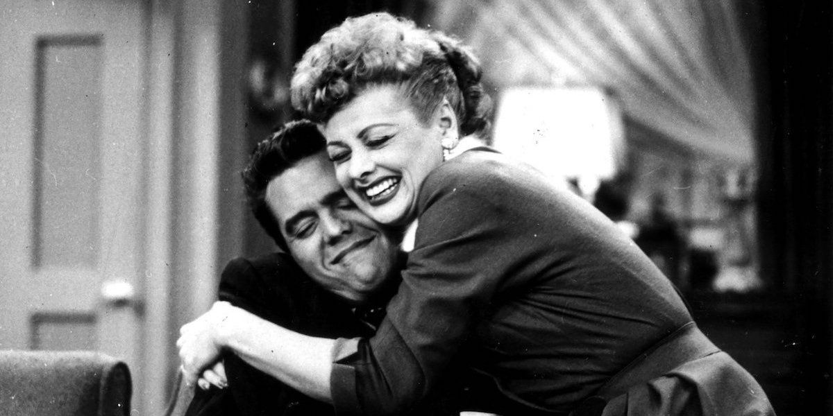 Lucy (Lucille Ball) and Ricky Ricardo (Desi Arnaz) embracing each other in &quot;I Love Lucy.&quot;