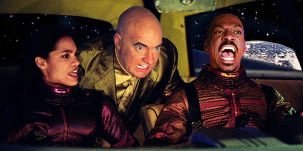 Scene from The Adventures of Pluto Nash in car with Eddie Murphy and co.