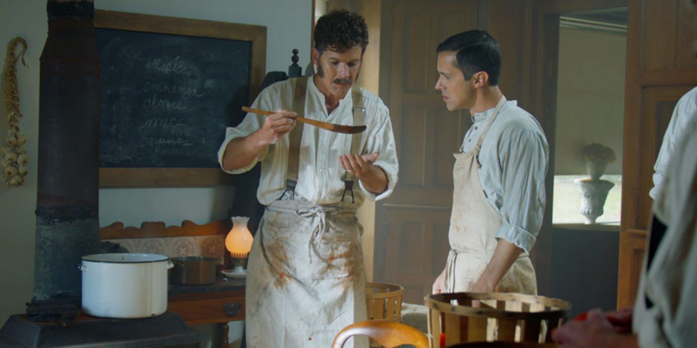 Two men cook food in a reenactment from The Food That Built America 