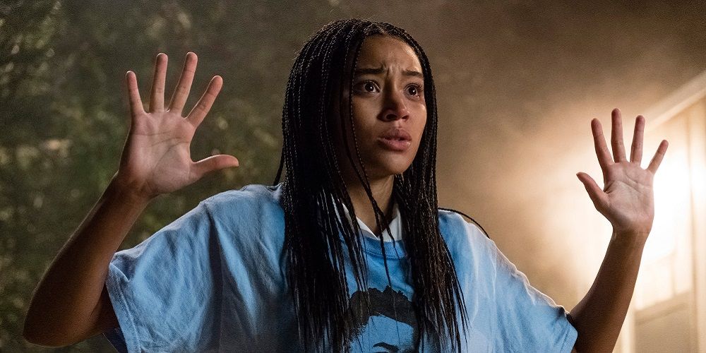 Starr raises arms to police in The Hate U Give
