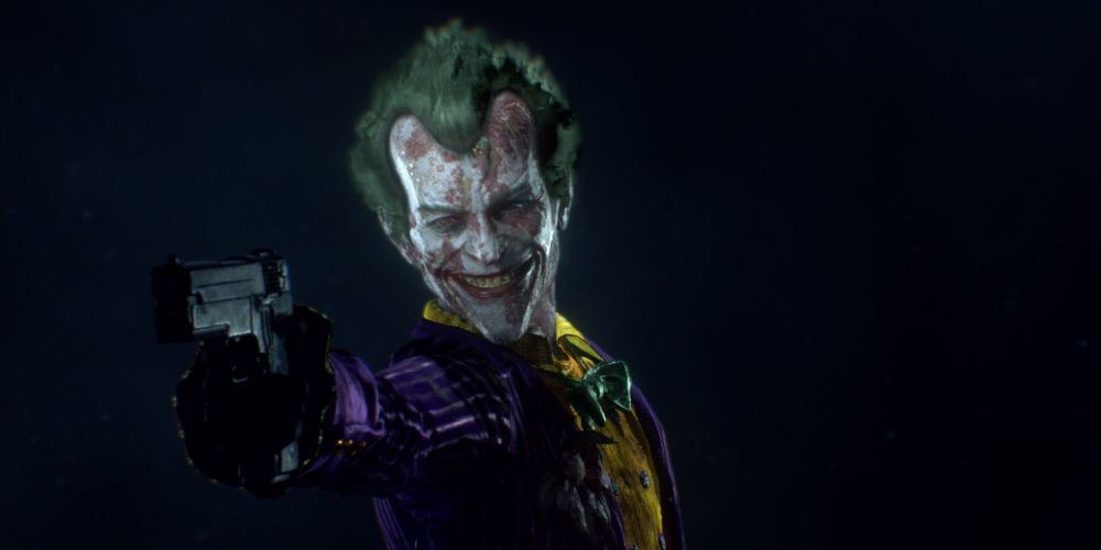 The Joker aims his gun while wearing his bright suit