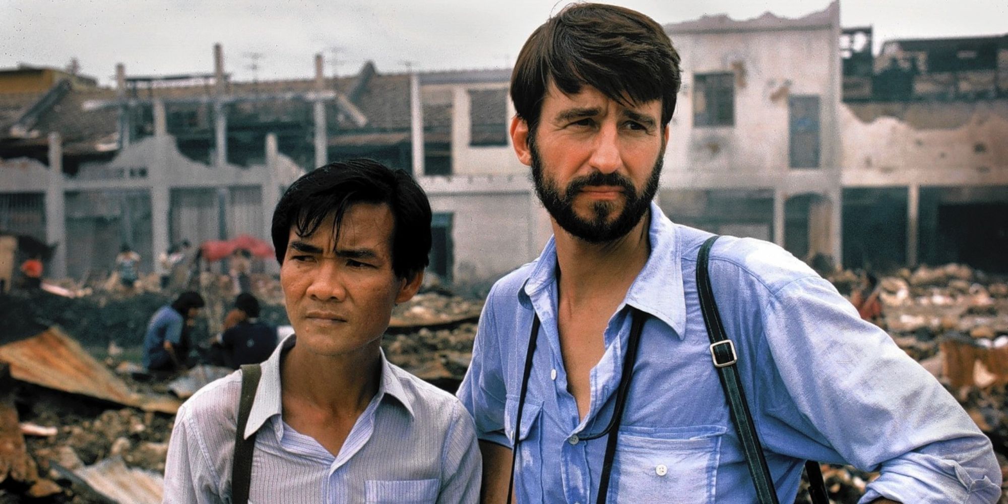 Sam Waterston and Haing S Ngor look on in The Killing Fields