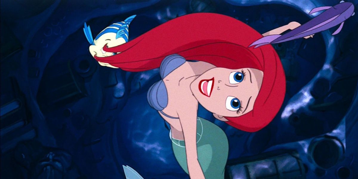 Ariel in her cave singing in The Little Mermaid