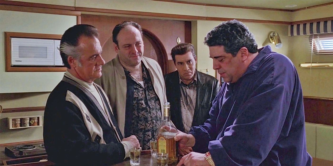 Paulie, Tony, Sal e Big Pussy em um barco em The Sopranos