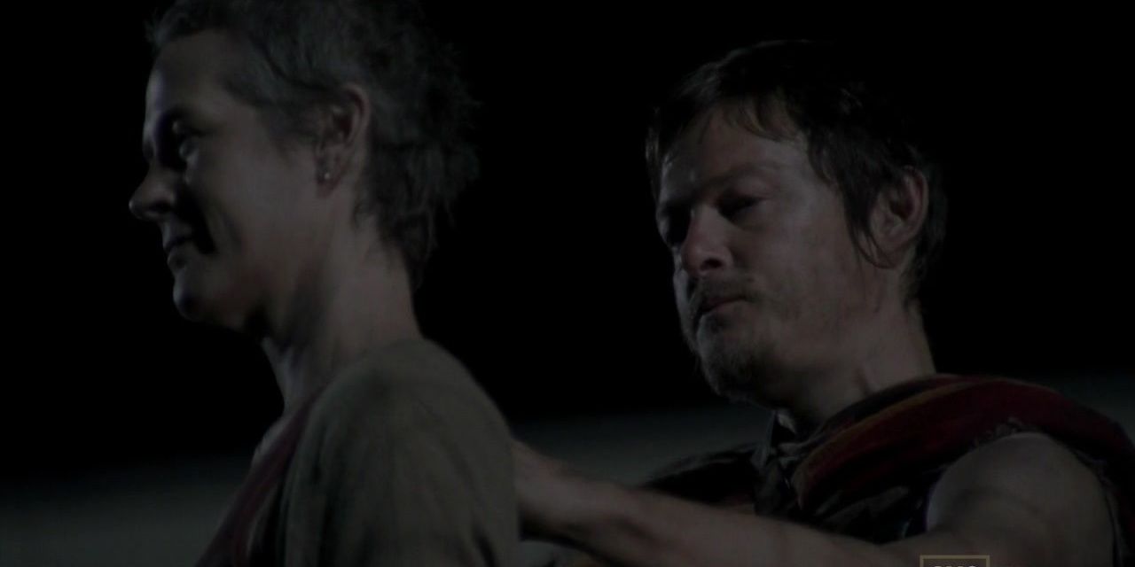 Daryl rubs Carol's shoulders in Season 3 Episode 1 of The Walking Dead