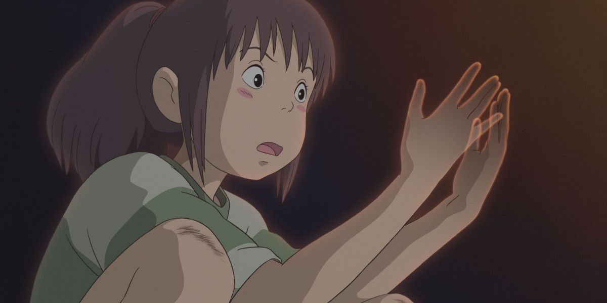 Chihiro watches herself begin to fade away in Spirited Away