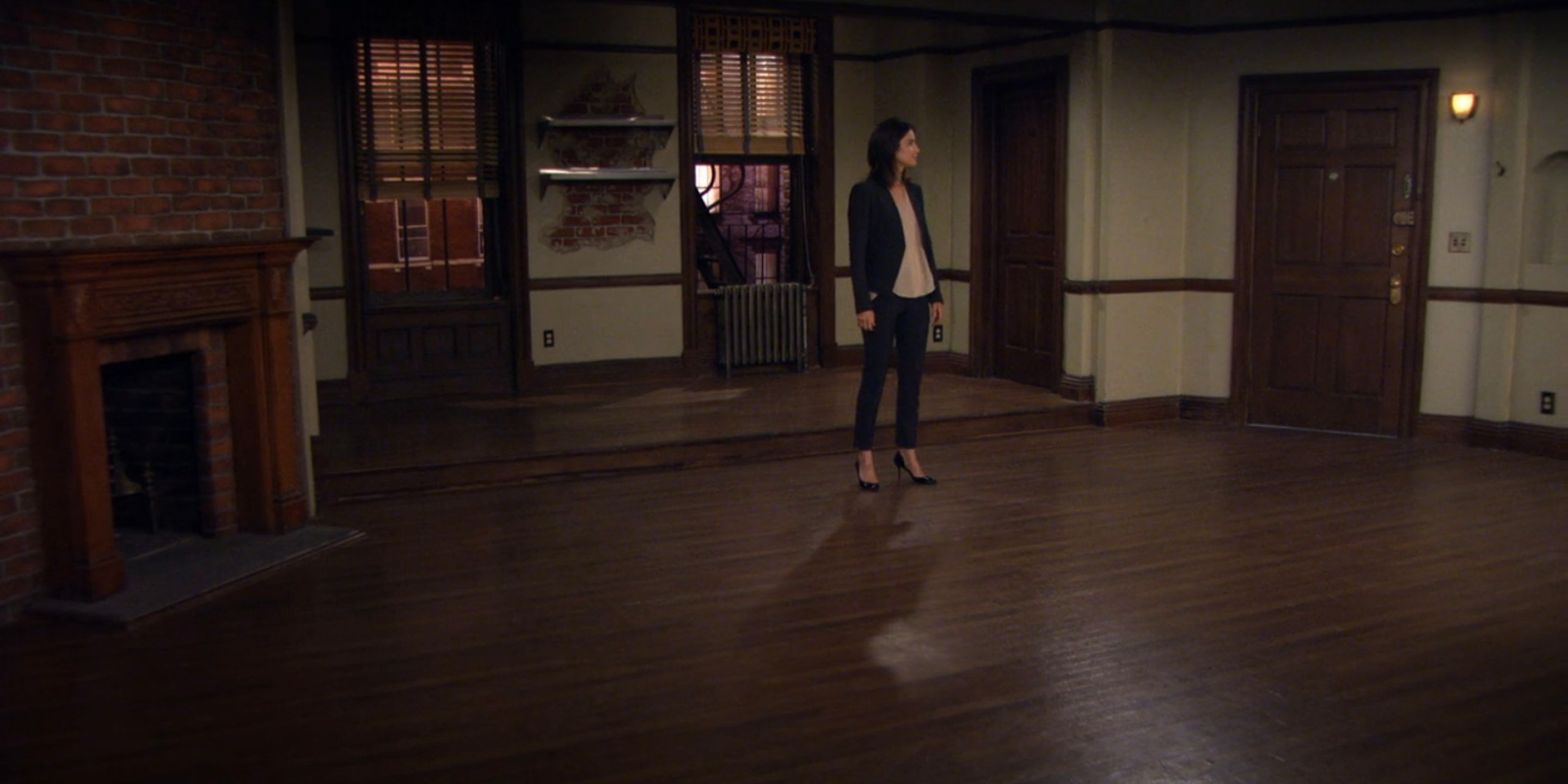 Robin Standing Alone In An Empty Apartment