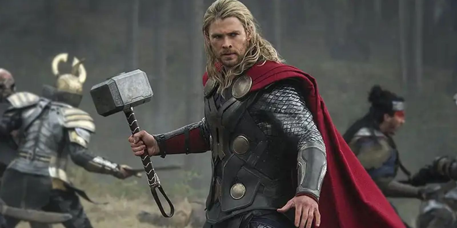Thor wielding mjolnir in battle in his first movie