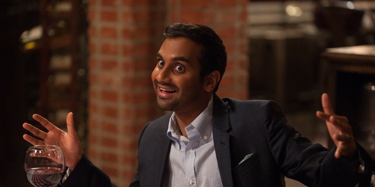 Tom Haverford with his arms out in a pose