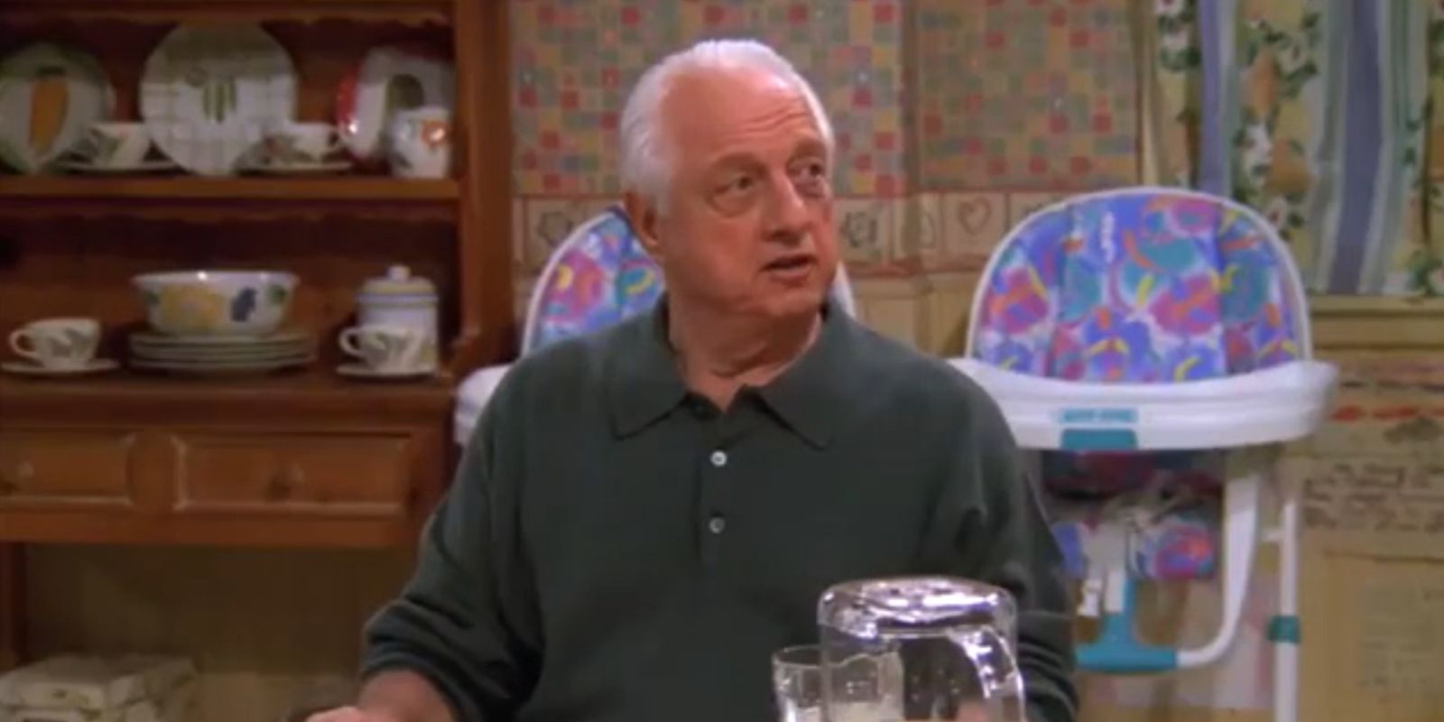 Tommy Lasorda sits in the Barone kitchen in Everybody Loves Raymond