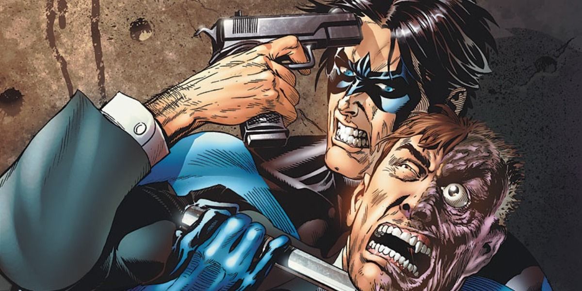 Nightwing chokes out Two Face who is trying to shoot him.