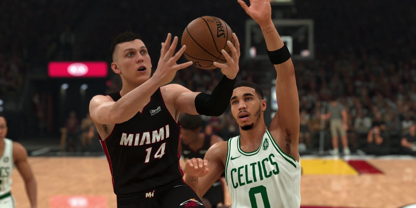 Tyler Herro lays it up past Jayson Tatum in NBA 2K21