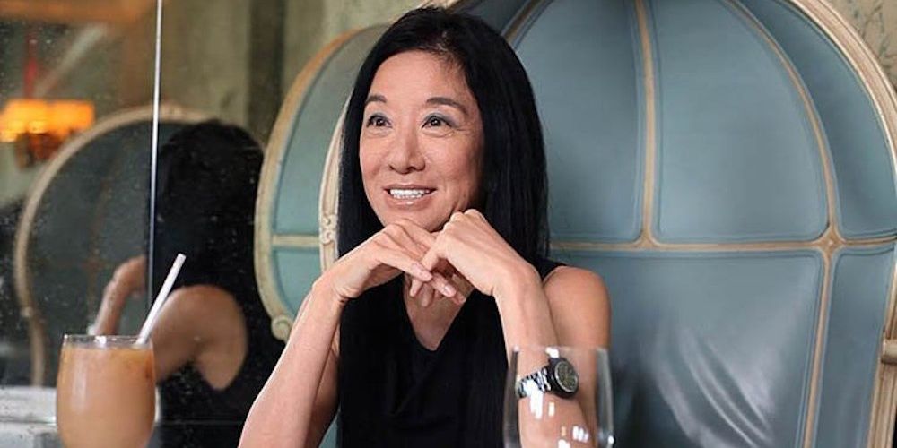 Vera Wang in Scatter My Ashes At Bergdorfs sitting with hands on chin