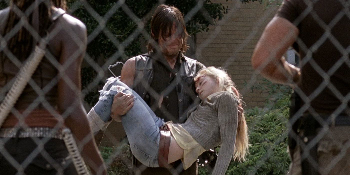 Daryl carries Beth's lifeless body outside in The Walking Dead