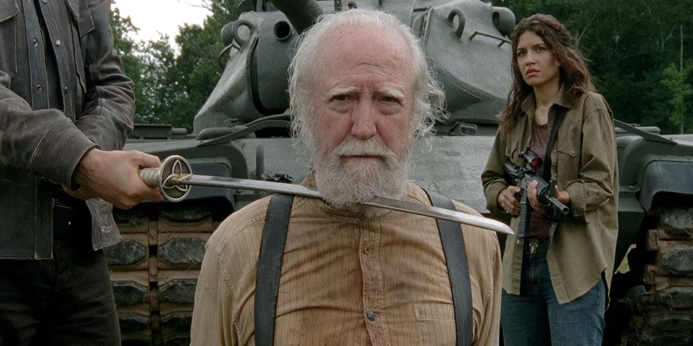 The Governor holds a sword to Hershel's throat in The Walking Dead